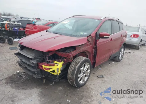 2014 Ford Escape Titanium z USA, uszkodzony, nr VIN 1FMCU0JX9EUE32840